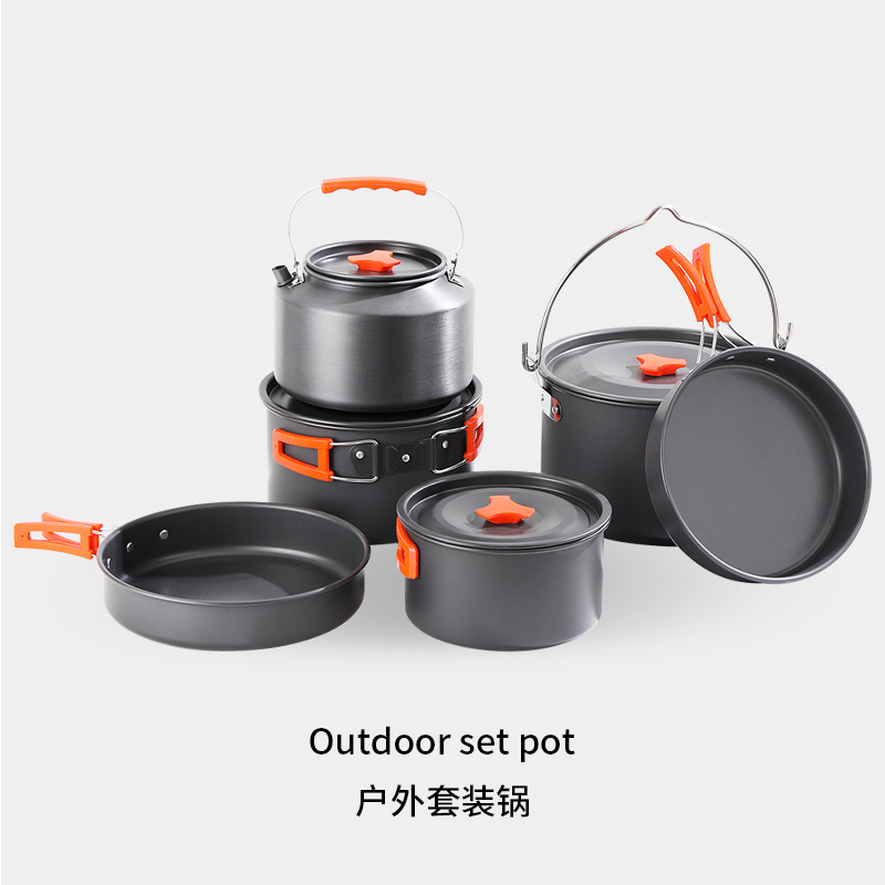Complete set of outdoor camping and cooking equipment, including camping cookware, kettle set, pot cover, hanging pot, and camping cooking utensils.